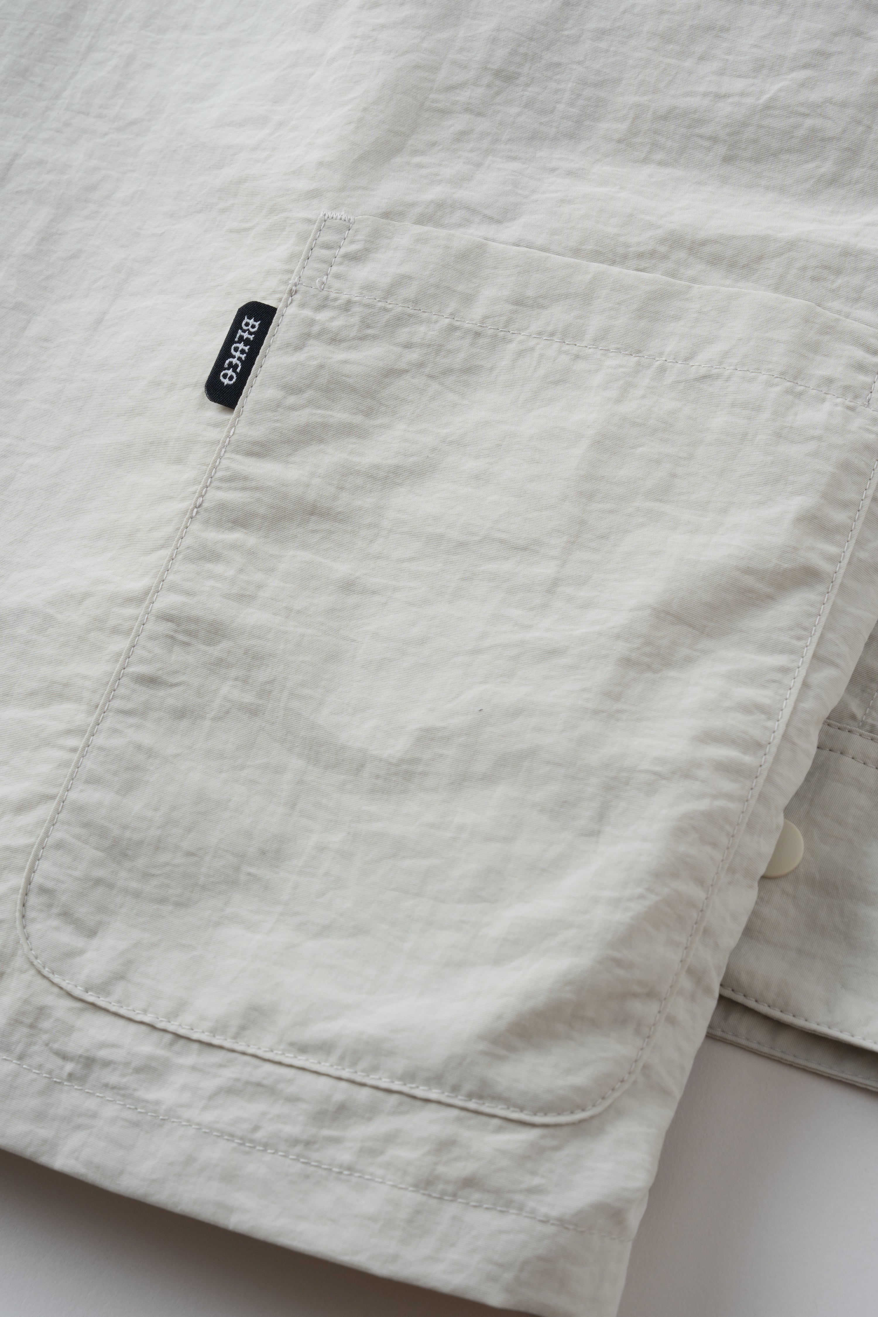 ナイロンフルジップシャツ