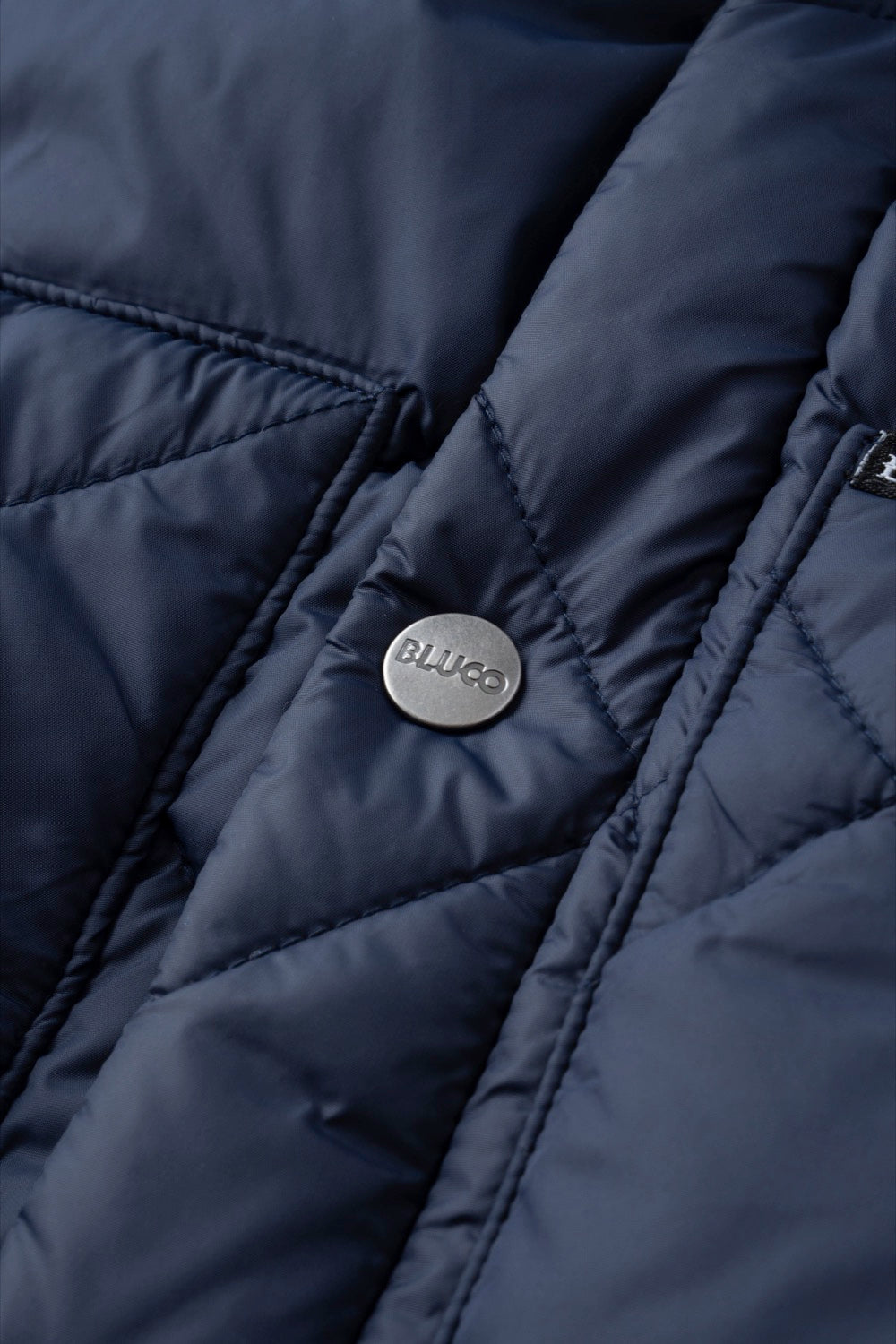 RIB COLLAR QUILTING VEST