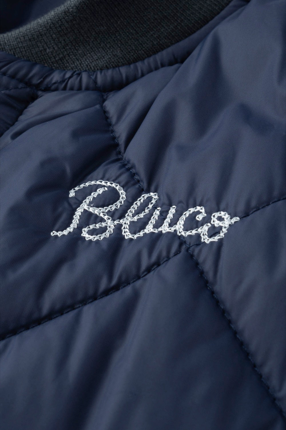 RIB COLLAR QUILTING VEST