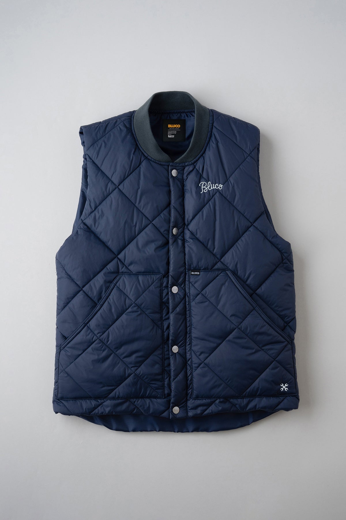 RIB COLLAR QUILTING VEST